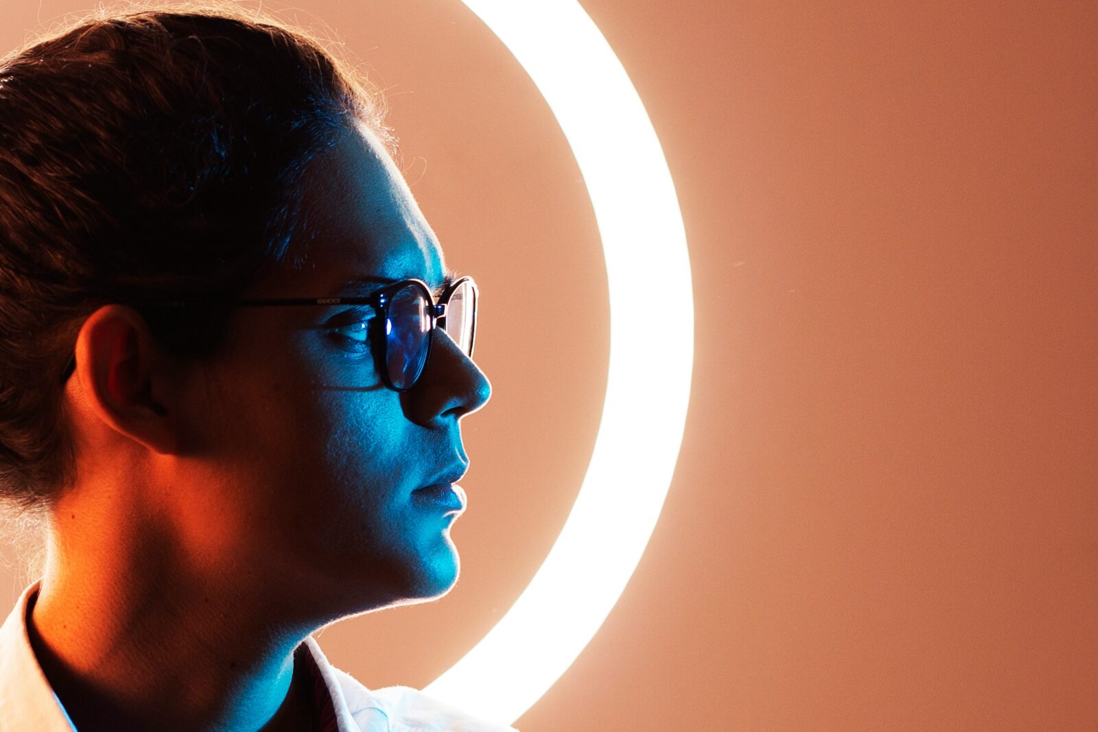 man wearing eyeglasses looking to the right